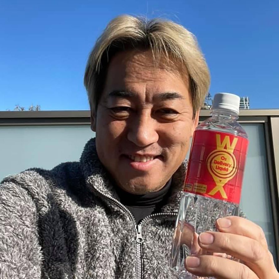 Athlete outdoors holding WOX