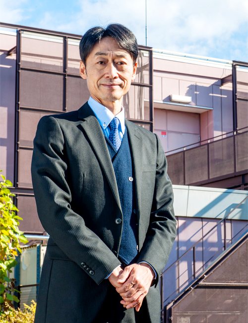 Portrait of Takaaki Matsumoto outside the company office
